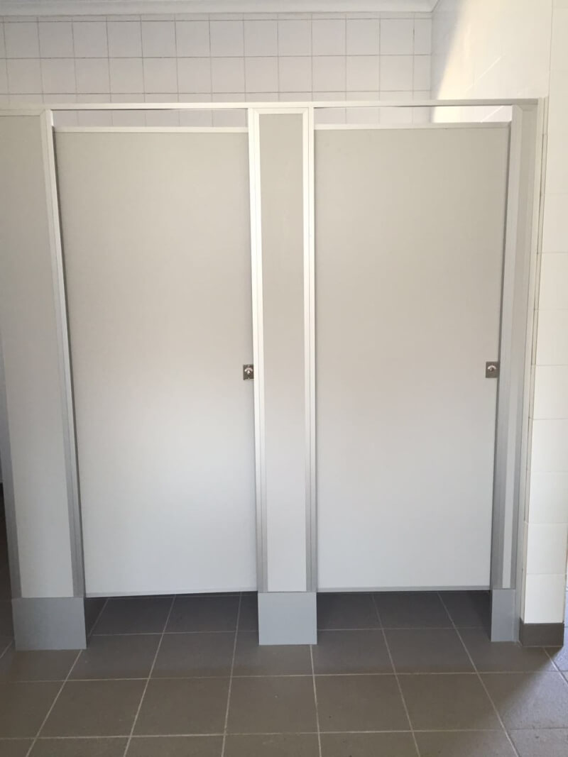 Toilet cubicle white doors